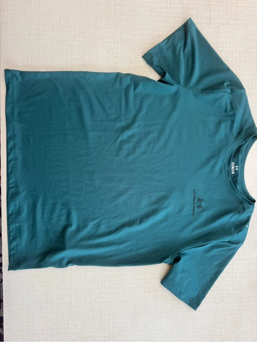 Under Armour youth large Teal Performance Short-Sleeve Tee